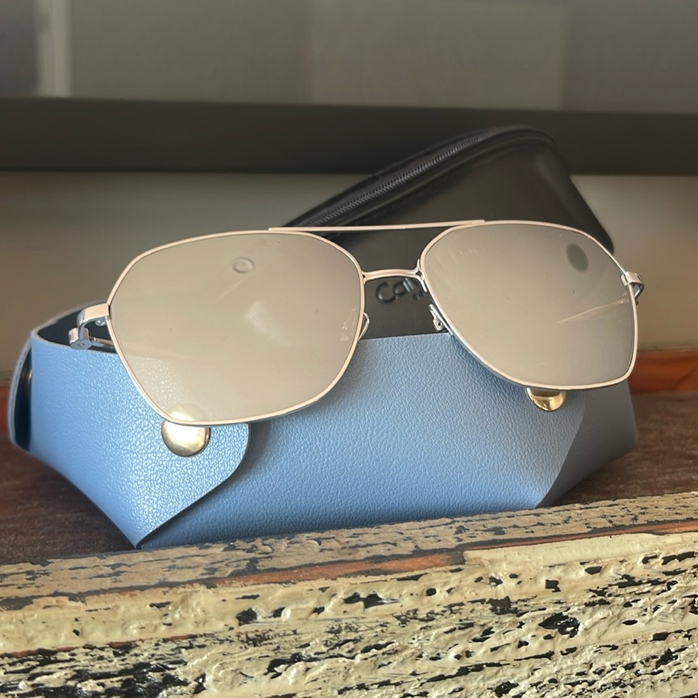 NWOT Gorgeous Calvin Klein Mirrored Sunglasses in a cool Silver Titanium